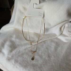 A New Day Gold Tone Triple Layered Necklace Sunburst Pendant NE18471CLGL NEW